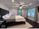 Serene bedroom with coffered ceilings, soft lighting, and stylish decor at 4040 Carrollton Ave, Indianapolis, IN 46205
