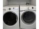 Laundry room featuring a side-by-side washer and dryer at 4040 Carrollton Ave, Indianapolis, IN 46205