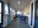Cozy screened-in porch featuring comfortable seating and stylish decor at 4040 Carrollton Ave, Indianapolis, IN 46205
