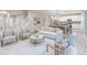 Spacious living room with a staircase, stylish decor, and an open-concept layout at 438 Weaver Ln, Pittsboro, IN 46167
