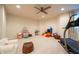 Versatile playroom area featuring toys, gym equipment, and room for recreational activities at 4420 Hickory Ridge Blvd, Greenwood, IN 46143