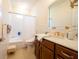 This bathroom features a large mirror, a tub-shower combo, and a vanity at 4420 Hickory Ridge Blvd, Greenwood, IN 46143