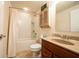 Standard bathroom featuring a shower and tub combo, vanity with sink, toilet, and vanity cabinet at 4420 Hickory Ridge Blvd, Greenwood, IN 46143