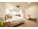Inviting bedroom with a window for natural light, cozy bedding, and stylish decor at 4420 Hickory Ridge Blvd, Greenwood, IN 46143
