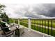 Outdoor deck with furniture and a view of the golf course at 4420 Hickory Ridge Blvd, Greenwood, IN 46143