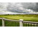 View of the lush golf course from the home's back deck at 4420 Hickory Ridge Blvd, Greenwood, IN 46143