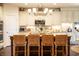 Bright kitchen with granite countertops, island seating, and stainless steel appliances at 4420 Hickory Ridge Blvd, Greenwood, IN 46143