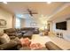 Cozy living area with comfortable seating, a large sectional sofa and soft textures throughout at 4420 Hickory Ridge Blvd, Greenwood, IN 46143