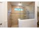 This large walk-in shower features great tilework, a glass surround, and multiple shower heads at 4420 Hickory Ridge Blvd, Greenwood, IN 46143