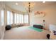 This large workout room features natural light from large windows, and plenty of space to exercise at 4420 Hickory Ridge Blvd, Greenwood, IN 46143