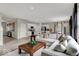 Bright, open living space with comfortable seating, stylish decor, and contemporary finishes at 4460 Laughter Ln, Indianapolis, IN 46235