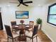 Staged dining room with vinyl plank flooring and scenic view at 5130 Navajo Ct, Columbus, IN 47203