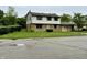 Charming two-story home with a brick and siding exterior, complemented by a well-manicured front lawn at 5130 Navajo Ct, Columbus, IN 47203