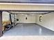 Spacious garage with epoxy flooring, providing ample storage and parking space at 5130 Navajo Ct, Columbus, IN 47203