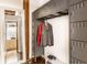 Unique hallway features metal storage lockers and a vintage mirror at 55 S Harding St # 308, Indianapolis, IN 46222