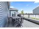 Comfortable back deck with an outdoor table and chairs, perfect for entertaining and enjoying the outdoors at 5848 Sheffield Ln, Whitestown, IN 46075