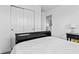 This bedroom features a closet with sliding doors and a modern ensuite bathroom at 5848 Sheffield Ln, Whitestown, IN 46075