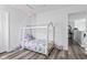 Cozy bedroom featuring a stylish canopy bed and hardwood floors at 5848 Sheffield Ln, Whitestown, IN 46075