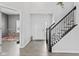 Spacious foyer with hardwood floors, staircase, and ample natural light at 5848 Sheffield Ln, Whitestown, IN 46075