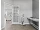 Hallway with a view into the living room and a side table and vacuum at 5848 Sheffield Ln, Whitestown, IN 46075