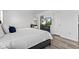 Serene main bedroom with a plush bed, TV, and view into a beautifully decorated space at 5848 Sheffield Ln, Whitestown, IN 46075