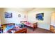 Bright, carpeted bedroom with large window and two twin beds at 6110 Pelican Ln, Columbus, IN 47201