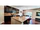 Modern kitchen with granite countertops and stainless steel appliances at 6110 Pelican Ln, Columbus, IN 47201