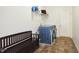 Organized laundry area with modern appliances, storage shelving and space saving bench at 6110 Pelican Ln, Columbus, IN 47201