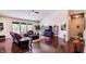 Open living room featuring vaulted ceilings, hardwood floors and bright windows at 6110 Pelican Ln, Columbus, IN 47201