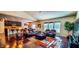 Open living and dining area with hardwood floors and ample natural light at 6110 Pelican Ln, Columbus, IN 47201