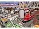 Intricate model train set layout showcasing miniature trains, landscapes, and industrial scenery at 6115 E 65Th Pl, Indianapolis, IN 46220