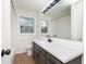 This bathroom features a new vanity and flooring at 625 E 106Th St, Carmel, IN 46280