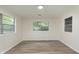 A cozy bedroom with neutral walls, new flooring, and bright natural light at 625 E 106Th St, Carmel, IN 46280