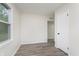 A simple bedroom featuring neutral walls and modern flooring at 625 E 106Th St, Carmel, IN 46280
