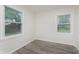 A bright bedroom with a window and modern flooring at 625 E 106Th St, Carmel, IN 46280