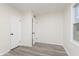 This bedroom features durable floors, closet and natural light at 625 E 106Th St, Carmel, IN 46280