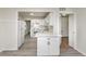 This charming kitchen boasts a white refrigerator, range, sink, cabinets, and countertop at 625 E 106Th St, Carmel, IN 46280