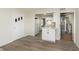Bright kitchen features white cabinets, modern countertops, and stainless steel appliances at 625 E 106Th St, Carmel, IN 46280