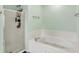 Bathroom offers a separate glass-enclosed shower and a soaking tub at 7312 Drum Castle Ct, Indianapolis, IN 46259