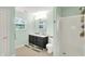Bathroom showcases a dual vanity with granite countertops and a glass-enclosed shower at 7312 Drum Castle Ct, Indianapolis, IN 46259