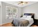 Bedroom showcases a bright room and large windows providing natural light and comfort at 7312 Drum Castle Ct, Indianapolis, IN 46259