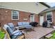 Outdoor deck with comfortable seating, a grill, and a view of the yard, perfect for entertaining and relaxation at 7312 Drum Castle Ct, Indianapolis, IN 46259