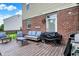Outdoor deck with comfortable seating, grill, and access to the home, perfect for entertaining and relaxation at 7312 Drum Castle Ct, Indianapolis, IN 46259