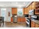 Well-equipped kitchen features stainless steel appliances and plenty of cabinet space at 7312 Drum Castle Ct, Indianapolis, IN 46259