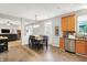 Bright kitchen with stainless steel appliances and a dining table in an open layout at 7312 Drum Castle Ct, Indianapolis, IN 46259