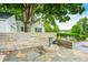 Charming home with stone fountain and landscaping at 7414 Mendenhall Rd, Camby, IN 46113