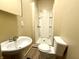 Simple bathroom featuring a vanity, toilet, and stand up shower at 745 N Tremont St, Indianapolis, IN 46222