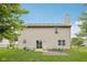 This home's backyard has a lovely patio, grass, and mature trees, great for entertaining or relaxing at 764 Port Dr, Avon, IN 46123