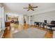 Open-concept with hardwood floors, a workspace, and a dining area at 764 Port Dr, Avon, IN 46123