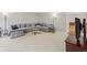 Inviting living room with soft carpeting, a large sectional sofa, and stylish decor at 764 Port Dr, Avon, IN 46123